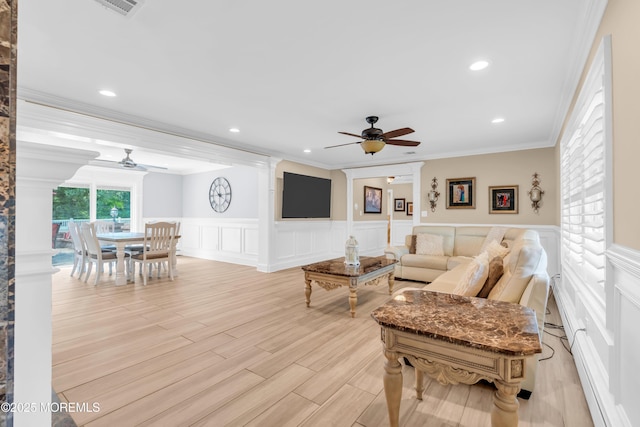 18 Pinewood Dr, Brick, NJ 08724 - living room with ceiling fan, ornamental molding, a decorative wall, wainscoting, and decorative columns