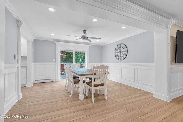18 Pinewood Dr, Brick, NJ 08724 - dining room featuring ceiling fan, ornamental molding, a baseboard radiator, a decorative wall, and wainscoting