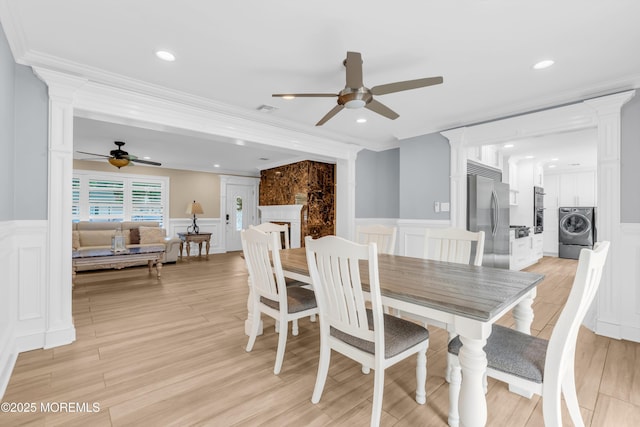 18 Pinewood Dr, Brick, NJ 08724 - dining space featuring washer / clothes dryer, a ceiling fan, a decorative wall, ornate columns, and crown molding