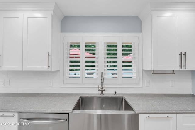 18 Pinewood Dr, Brick, NJ 08724 - kitchen with stainless steel dishwasher, decorative backsplash, and white cabinetry