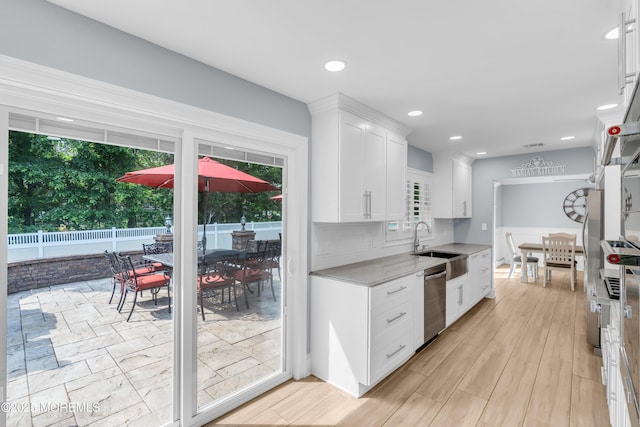 18 Pinewood Dr, Brick, NJ 08724 - kitchen featuring stainless steel dishwasher, white cabinetry, light wood-style floors, and recessed lighting