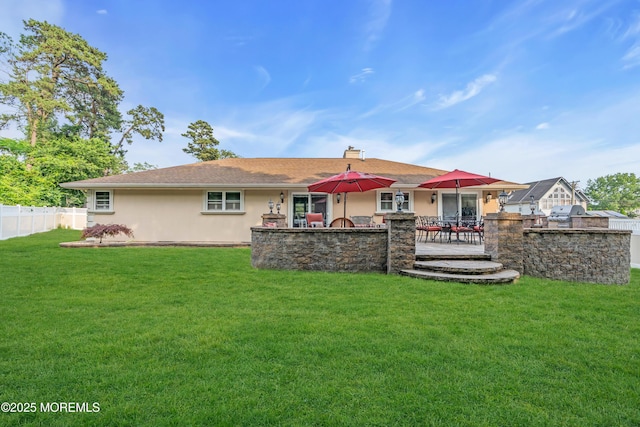 18 Pinewood Dr, Brick, NJ 08724 - rear view of house featuring stucco siding, an outdoor kitchen, and a chimney