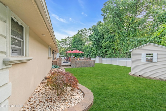 18 Pinewood Dr, Brick, NJ 08724 - fenced backyard featuring a storage unit and a wooden deck