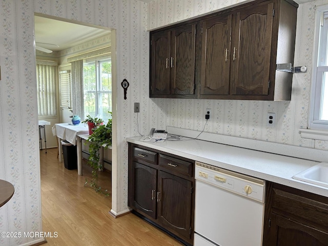 5 Lamb Rd, Brick, NJ 08724 - kitchen featuring white dishwasher, light wood-style flooring, wallpapered walls, dark brown cabinets, and light countertops