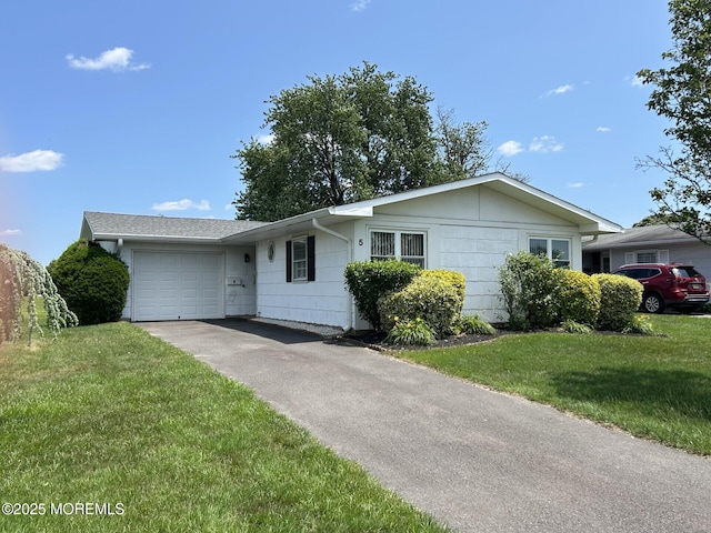 5 Lamb Rd, Brick, NJ 08724 - single story home with a garage, asphalt driveway, and a front lawn