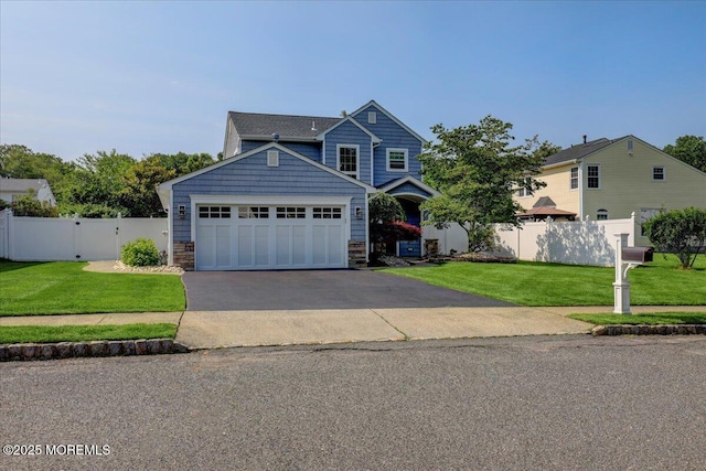46 Sweet Gum Rd, Howell, NJ 07731 - view of front of house with stone siding and driveway