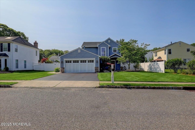 46 Sweet Gum Rd, Howell, NJ 07731 - traditional-style home with driveway, stone siding, and a garage