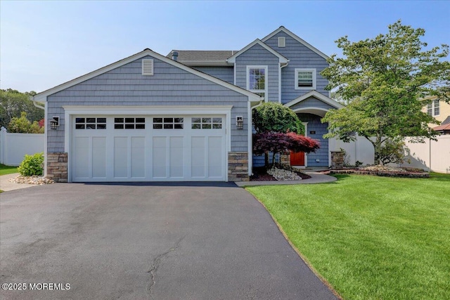 46 Sweet Gum Rd, Howell, NJ 07731 - view of front facade featuring stone siding, driveway, and an attached garage