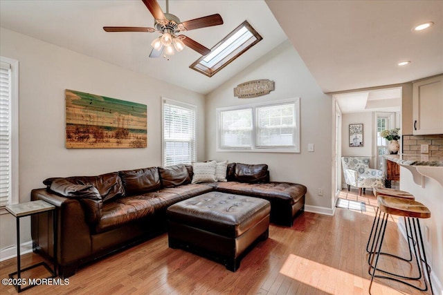 46 Sweet Gum Rd, Howell, NJ 07731 - living room featuring ceiling fan, light wood finished floors, a skylight, recessed lighting, and high vaulted ceiling