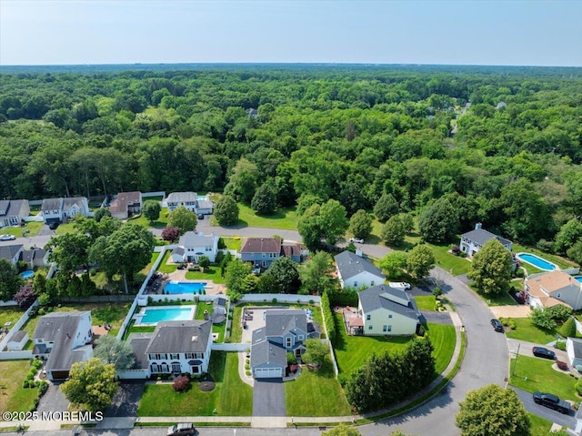 46 Sweet Gum Rd, Howell, NJ 07731 - aerial perspective of suburban area with a heavily wooded area and a pool area