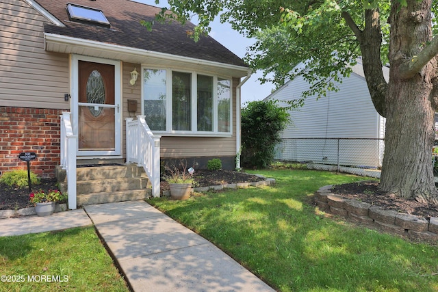 8 Donnelly St, Union Beach, NJ 07735 - doorway to property featuring a shingled roof