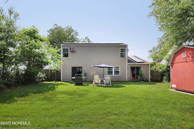 8 Donnelly St, Union Beach, NJ 07735 - back of property with a storage unit and roof mounted solar panels