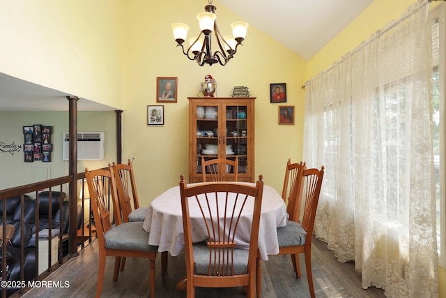 8 Donnelly St, Union Beach, NJ 07735 - dining room with vaulted ceiling, wood finished floors, a chandelier, and an AC wall unit