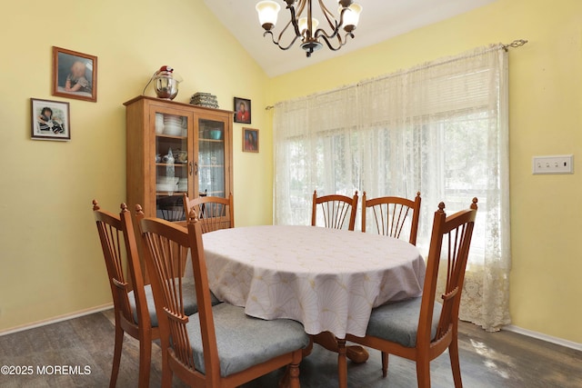 8 Donnelly St, Union Beach, NJ 07735 - dining space featuring a chandelier, plenty of natural light, vaulted ceiling, and wood finished floors
