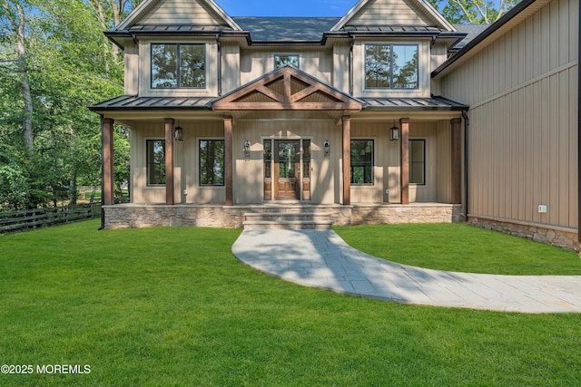 379 Buckalew Rd, Freehold, NJ 07728 - view of front of property with a standing seam roof, a porch, and a metal roof