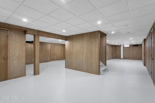 16 Chestnut Dr, Colts Neck, NJ 07722 - finished basement featuring wood walls, recessed lighting, and a drop ceiling