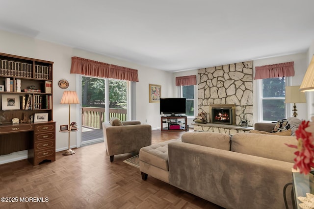 16 Chestnut Dr, Colts Neck, NJ 07722 - living area featuring a fireplace and baseboards