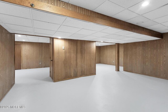 16 Chestnut Dr, Colts Neck, NJ 07722 - finished basement featuring a drop ceiling and wood walls