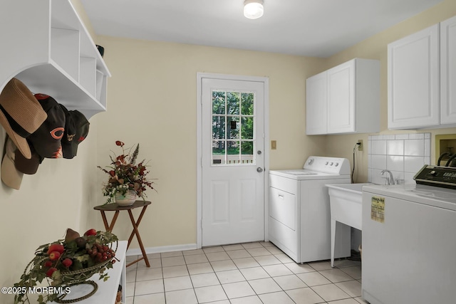 16 Chestnut Dr, Colts Neck, NJ 07722 - laundry area with independent washer and dryer, cabinet space, and light tile patterned flooring