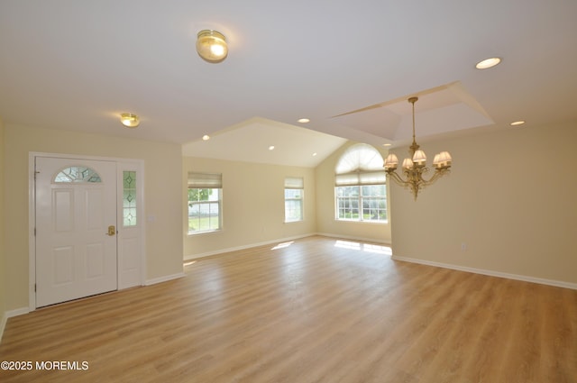 3168 Wood Spring Ln, Toms River, NJ 08755 - foyer with a chandelier, light wood-style floors, recessed lighting, and vaulted ceiling