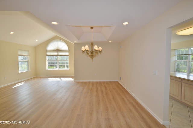 3168 Wood Spring Ln, Toms River, NJ 08755 - empty room featuring a chandelier, light wood finished floors, a tray ceiling, and recessed lighting
