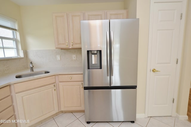 3168 Wood Spring Ln, Toms River, NJ 08755 - kitchen with stainless steel fridge with ice dispenser, light tile patterned floors, light countertops, and light brown cabinets