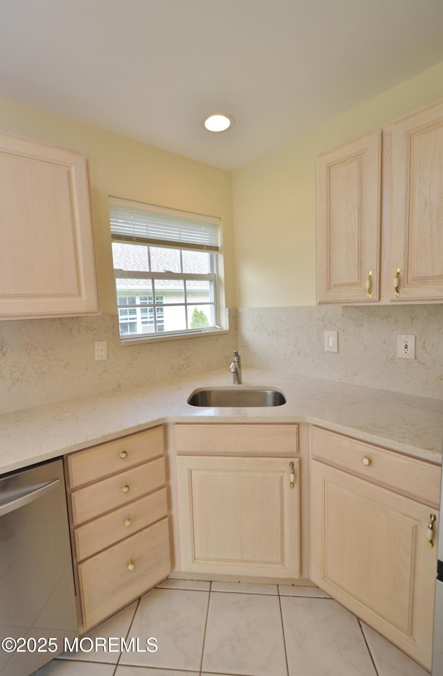 3168 Wood Spring Ln, Toms River, NJ 08755 - kitchen featuring light brown cabinetry, stainless steel dishwasher, light tile patterned floors, tasteful backsplash, and light stone counters