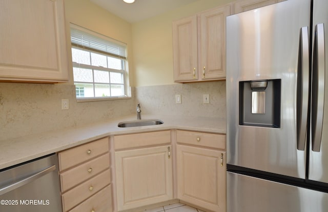 3168 Wood Spring Ln, Toms River, NJ 08755 - kitchen featuring stainless steel appliances, tasteful backsplash, light stone countertops, and light brown cabinets