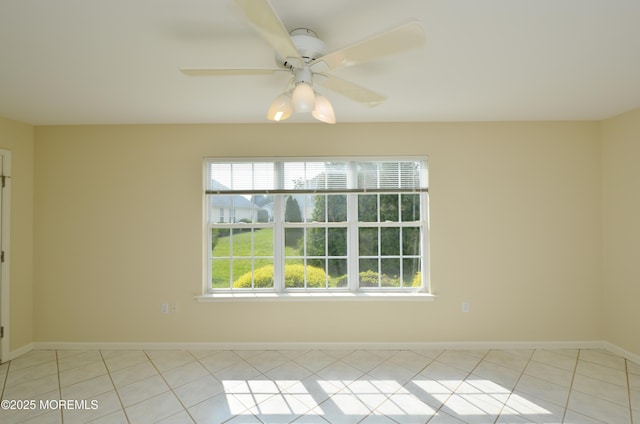 3168 Wood Spring Ln, Toms River, NJ 08755 - spare room featuring light tile patterned flooring and a ceiling fan
