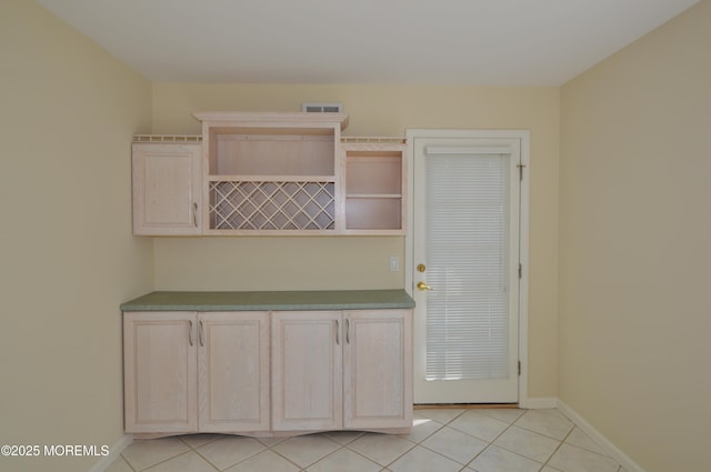 3168 Wood Spring Ln, Toms River, NJ 08755 - kitchen featuring open shelves, light tile patterned floors, and dark countertops