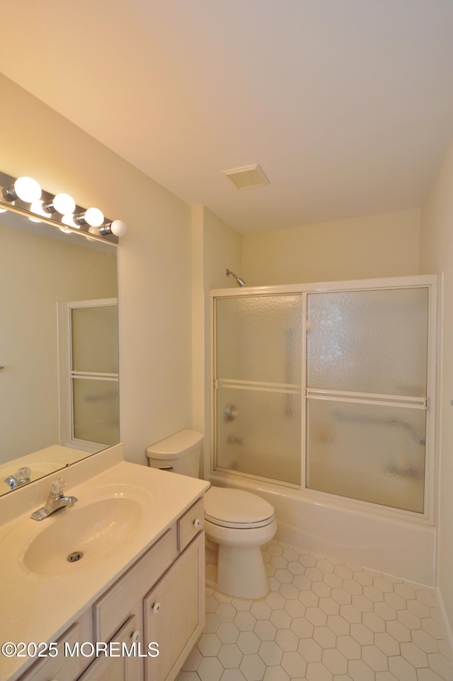 3168 Wood Spring Ln, Toms River, NJ 08755 - bathroom featuring vanity, shower / bath combination with glass door, and tile patterned floors