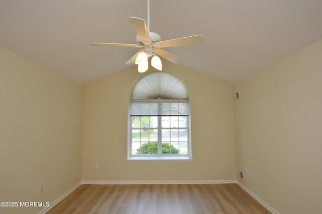 3168 Wood Spring Ln, Toms River, NJ 08755 - spare room featuring light wood-style floors, ceiling fan, and lofted ceiling