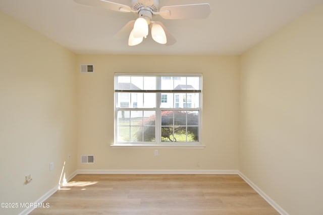 3168 Wood Spring Ln, Toms River, NJ 08755 - unfurnished room with light wood-style flooring and ceiling fan