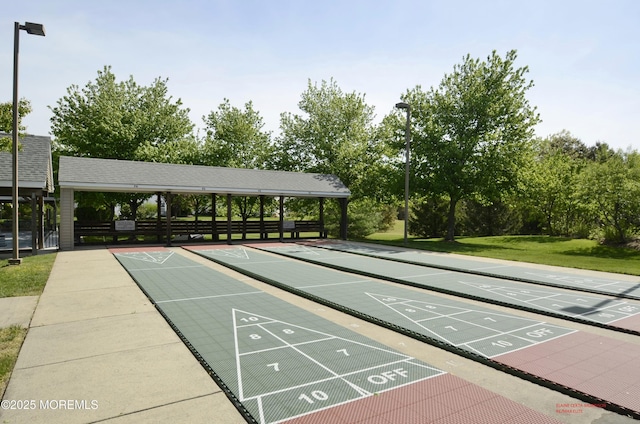 3168 Wood Spring Ln, Toms River, NJ 08755 - view of community featuring a yard and shuffleboard