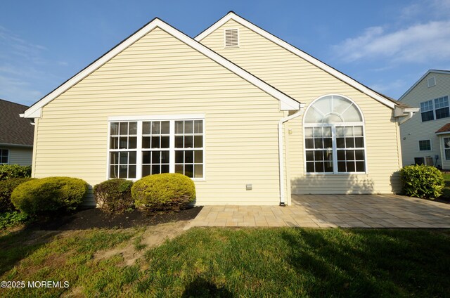 3168 Wood Spring Ln, Toms River, NJ 08755 - back of property with a patio area