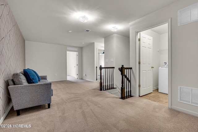 44 Begonia Ln, Monroe, NJ 08831 - sitting room featuring an upstairs landing, light colored carpet, and washer / dryer