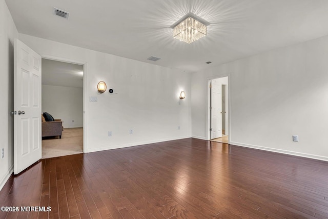 44 Begonia Ln, Monroe, NJ 08831 - spare room with a chandelier and hardwood / wood-style flooring