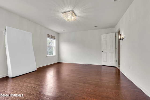 44 Begonia Ln, Monroe, NJ 08831 - unfurnished room with wood-type flooring and a chandelier