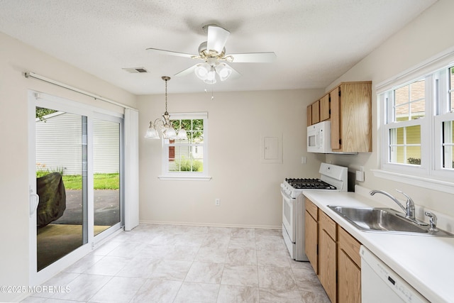 23 Datchet Close Unit 1000, Freehold, NJ 07728 - kitchen with white appliances, plenty of natural light, light countertops, a ceiling fan, and a textured ceiling