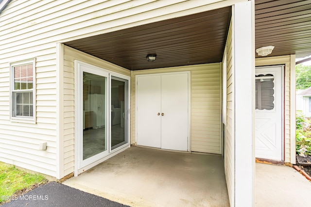 23 Datchet Close Unit 1000, Freehold, NJ 07728 - view of exterior entry with a patio area
