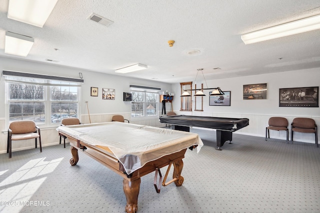 23 Datchet Close Unit 1000, Freehold, NJ 07728 - rec room with pool table, a wainscoted wall, light colored carpet, and a textured ceiling