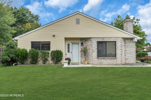 45 Victory Ct, Old Bridge, NJ 08857 - view of front of home featuring a chimney and a front yard