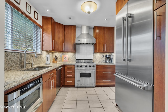 45 Victory Ct, Old Bridge, NJ 08857 - kitchen featuring premium appliances, wall chimney range hood, backsplash, and light stone countertops