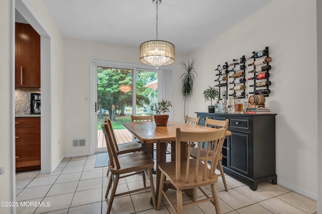 45 Victory Ct, Old Bridge, NJ 08857 - dining room featuring light tile patterned floors and a chandelier