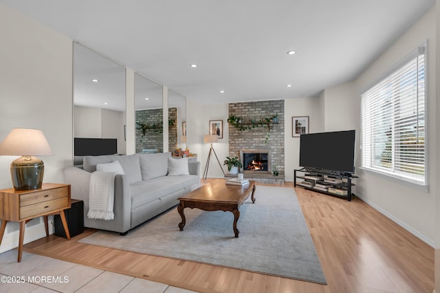 45 Victory Ct, Old Bridge, NJ 08857 - living area featuring a brick fireplace, light wood finished floors, and recessed lighting