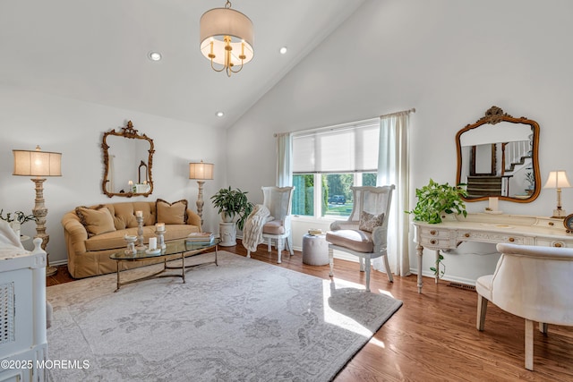 3058 Governors Xing, Wall, NJ 07719 - living area with high vaulted ceiling, wood finished floors, recessed lighting, and a chandelier