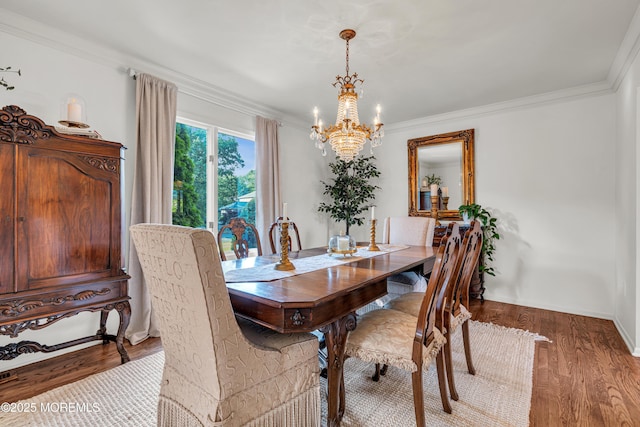 3058 Governors Xing, Wall, NJ 07719 - dining space featuring a chandelier, crown molding, and wood finished floors