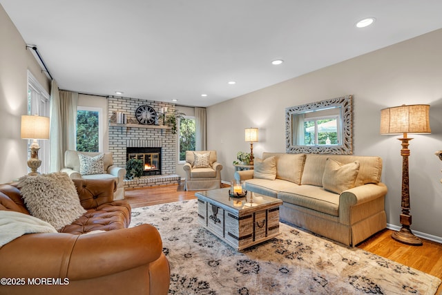 3058 Governors Xing, Wall, NJ 07719 - living area featuring healthy amount of natural light, wood finished floors, recessed lighting, and a fireplace