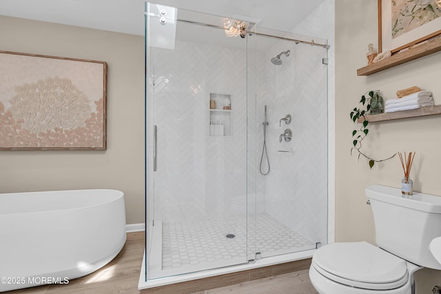 3058 Governors Xing, Wall, NJ 07719 - full bathroom featuring wood finished floors, a freestanding tub, and a stall shower