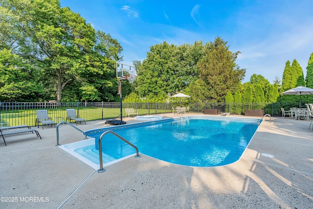 3058 Governors Xing, Wall, NJ 07719 - view of swimming pool with a patio area, a jacuzzi, and view of scattered trees